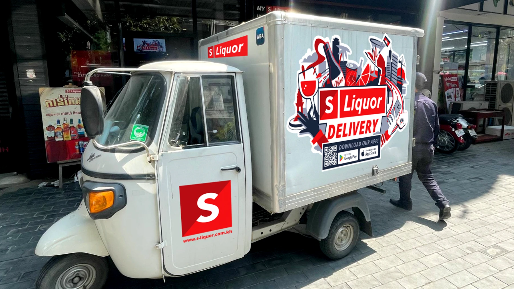 S Liquor branded delivery tuk-tuk with illustrated artwork