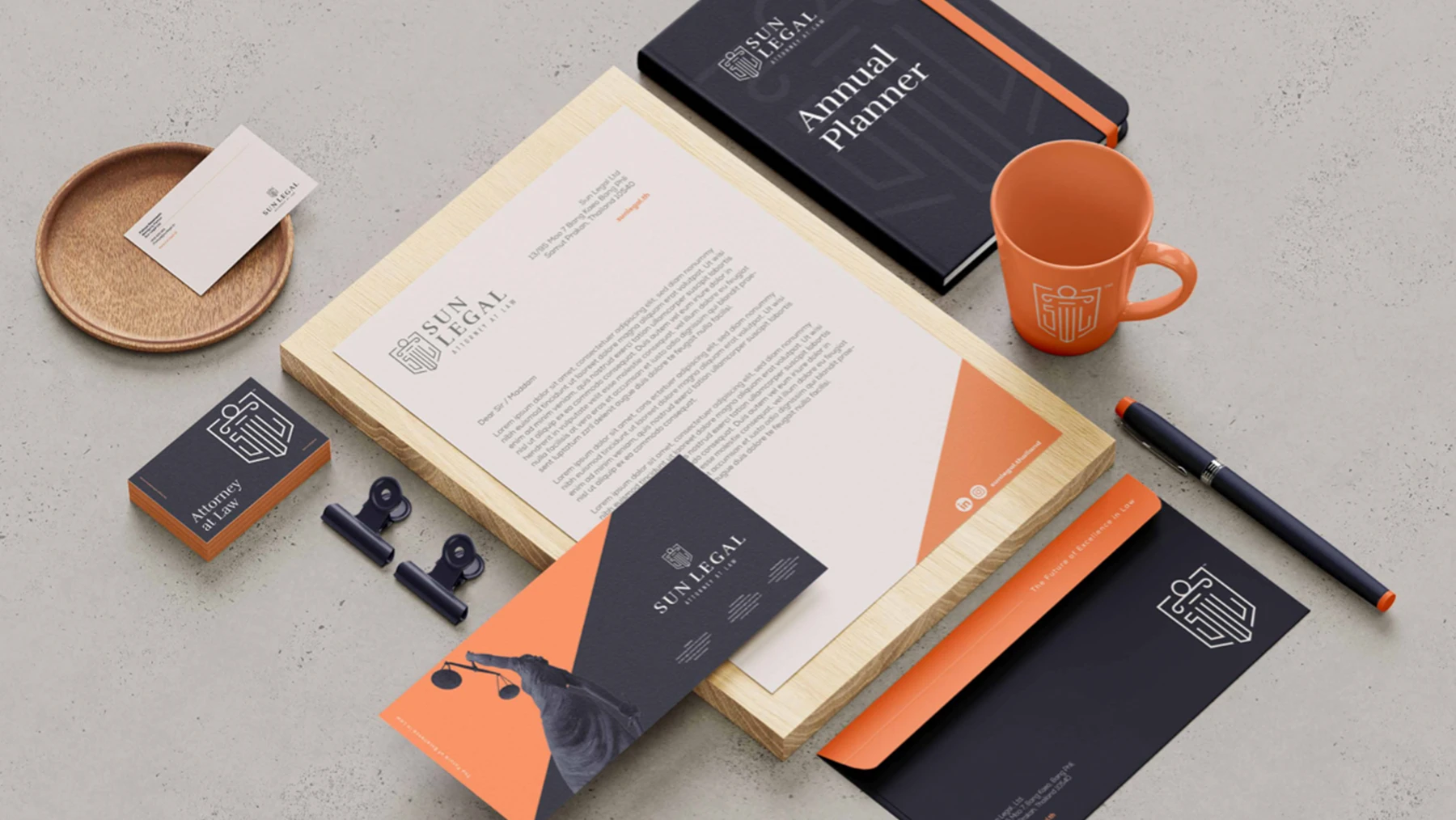 Sun Legal stationery suite: letterhead, business cards, envelope and branded mug